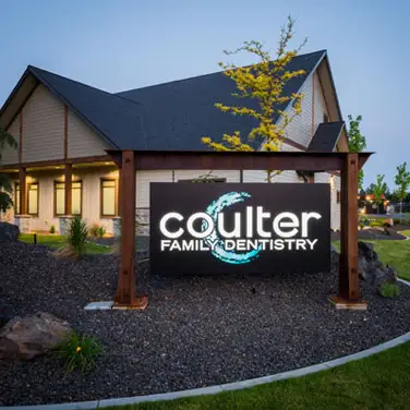 Exterior of building with a sign out front at Coulter Family Dentistry 