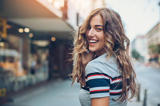 Woman smiling after getting a tooth colored restoration at Coulter Family Dentistry in Spokane Valley, WA 